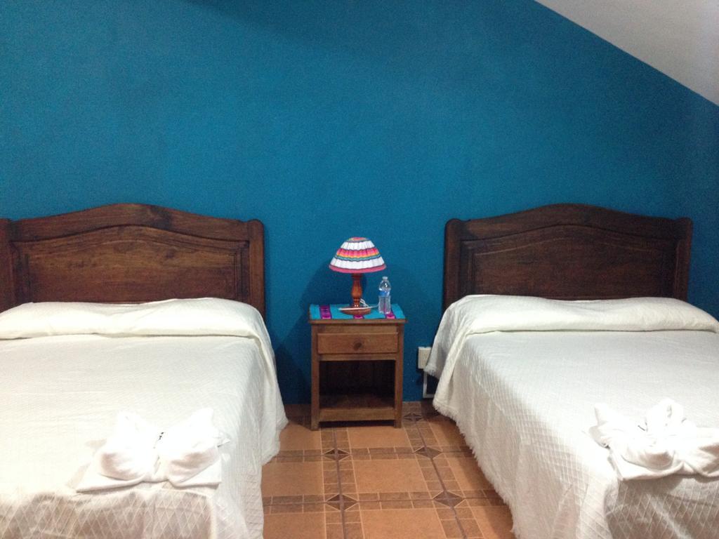 Hotel Posada Las Rosas Сан-Кристобаль-де-Ла-Касас Номер фото